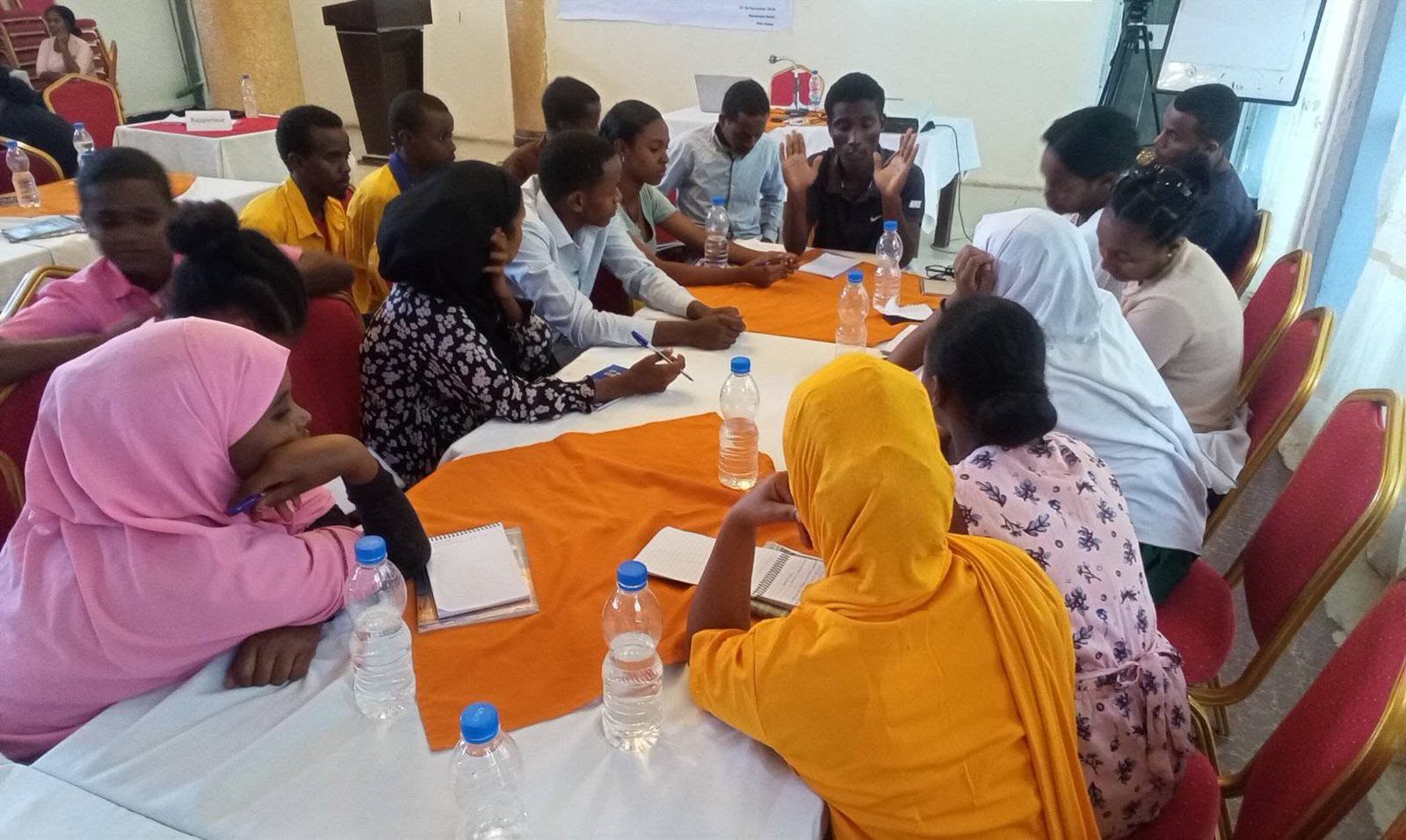 Roundtable discussion with a mixed group of younger and older participants